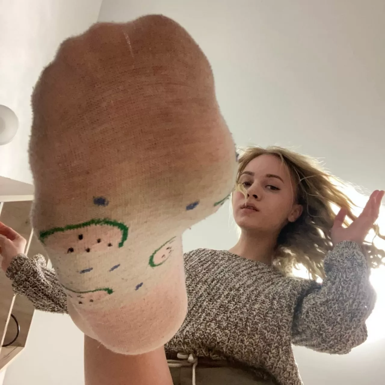 Cute face and dirty socks