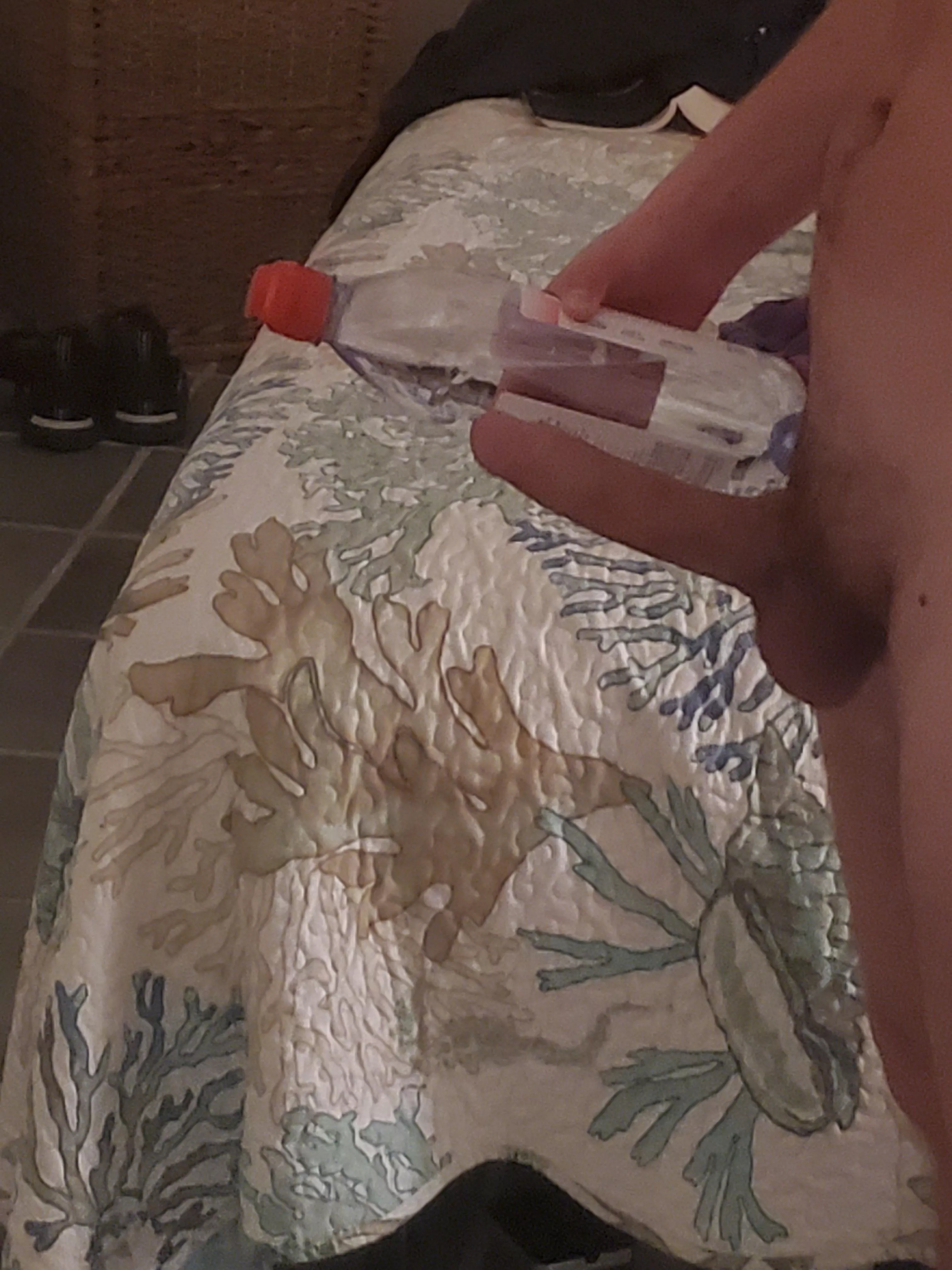 Next to a 750 ml bottle