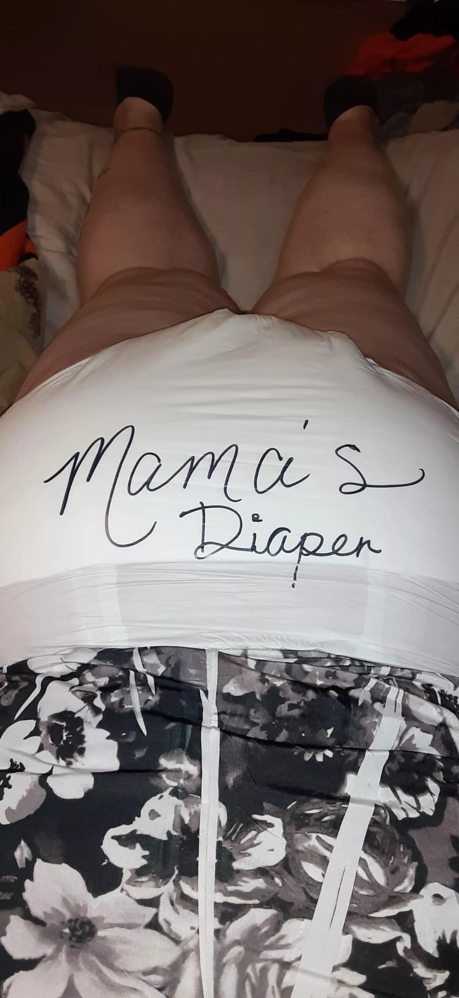 So, my husband got creative on my diaper.