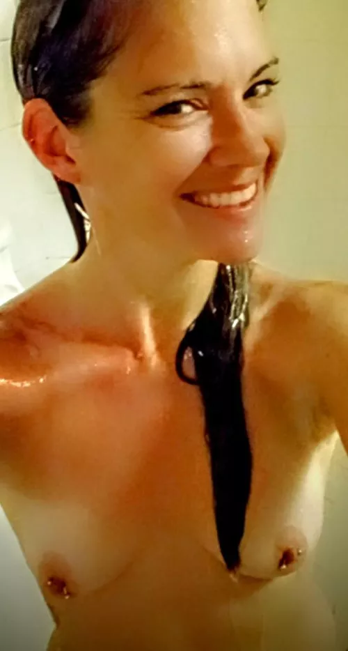 I'm willing to risk getting my phone wet to capture these beautiful pierced titties in the shower!