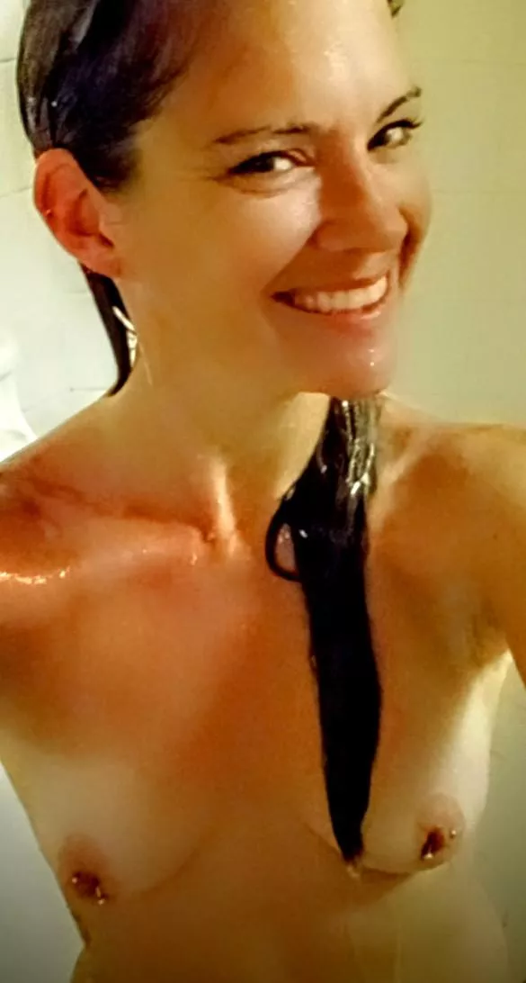 I'm willing to risk getting my phone wet to capture these beautiful pierced titties in the shower!
