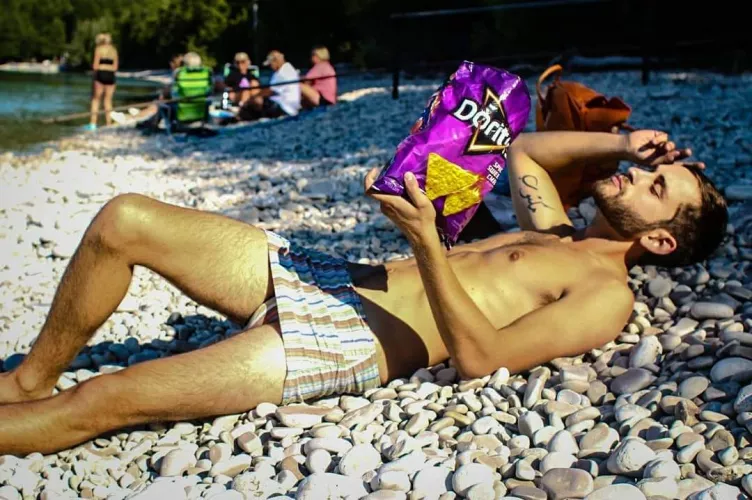 Back in my skinny days. Wearing a striped short skirt.