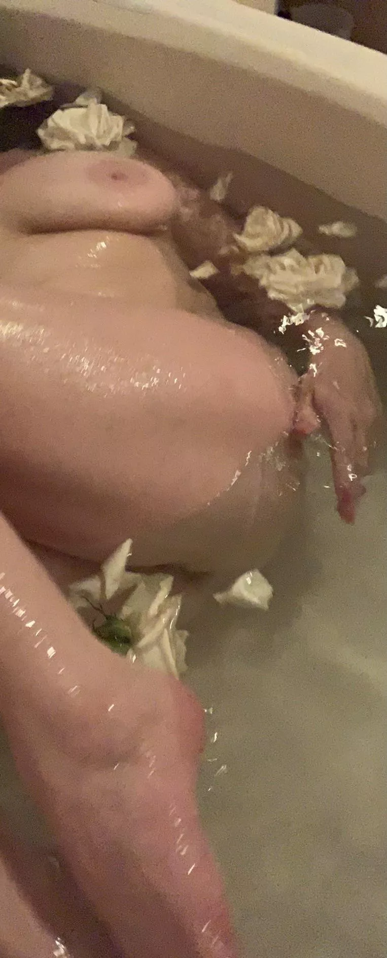 I love how rose petals in a bathtub feels on my skin.