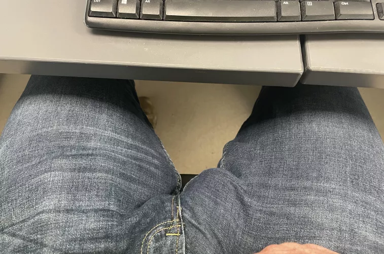 My coworker keeps looking over, she’s definitely seen my bulge.
