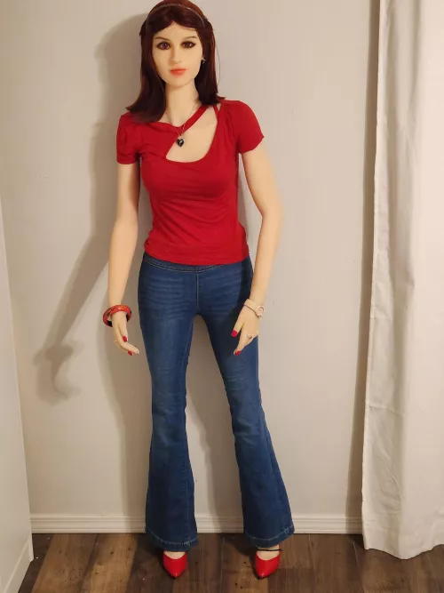 The staple of every woman's wardrobe are skinny jeans and a pair of red high heals. Happy High Heals Friday!!!