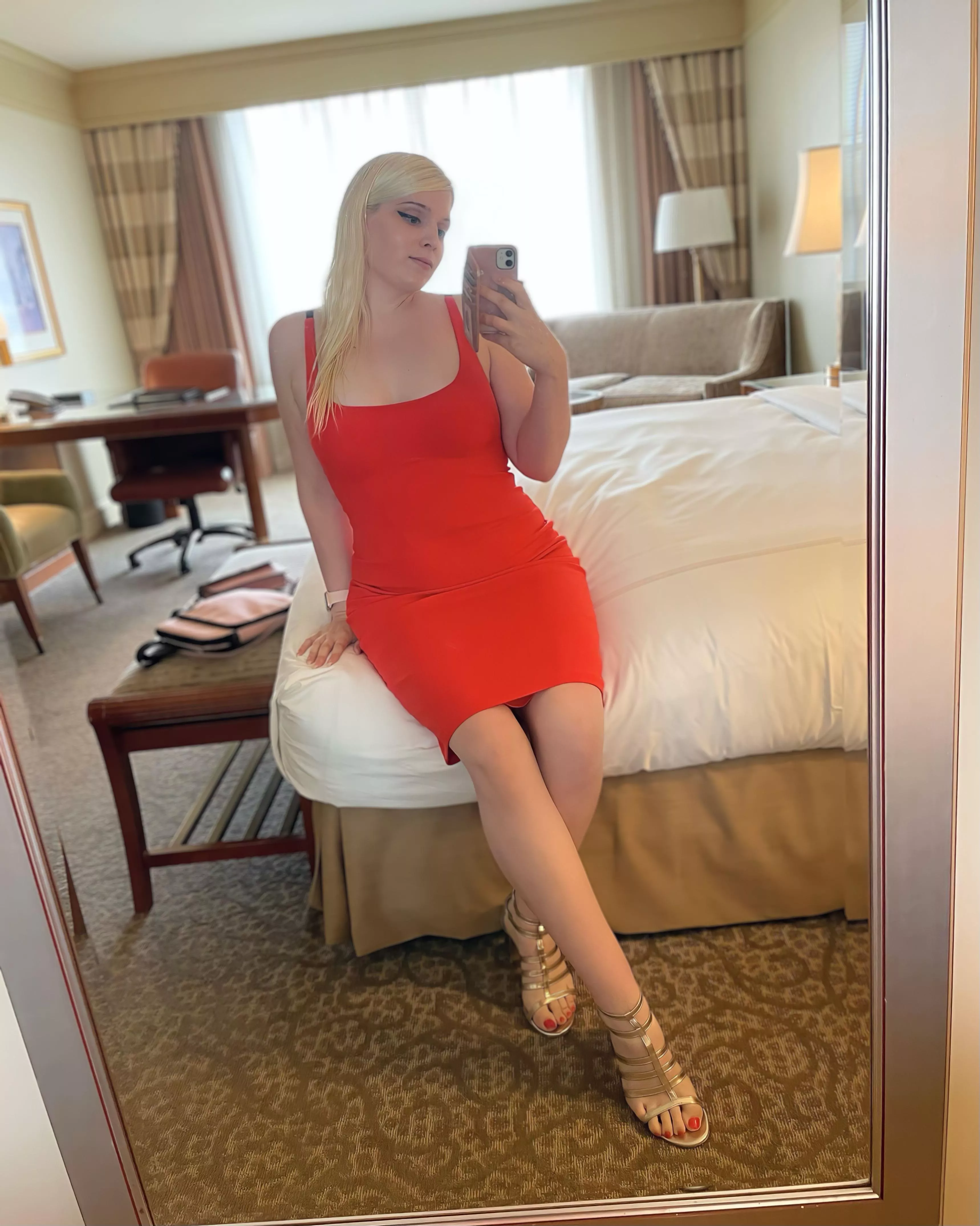 A red femboy with gold heels 💝