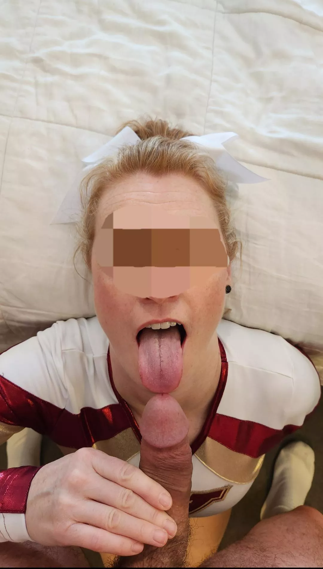 Asked my wife to put on her old cheerleader uniform and she gleefully agreed. Who doesn't love the ginger cheerleader on the squad with the freckles