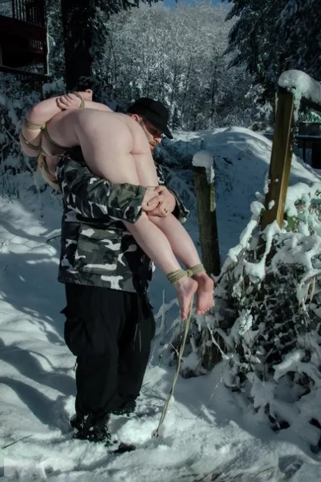 Bad girls get bound and taken to the snowy forest.