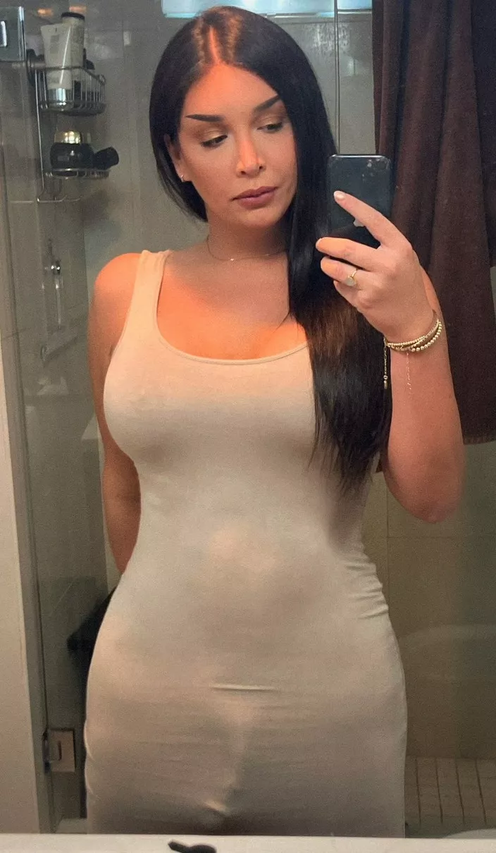 Tgirl bulging out of dress