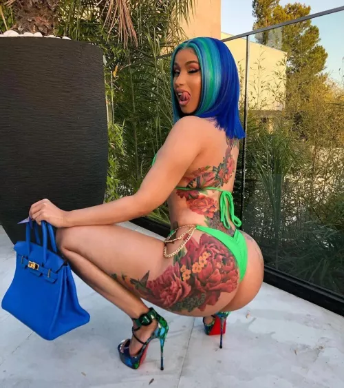 Thinking about Cardi B and her packing a massive girlcock