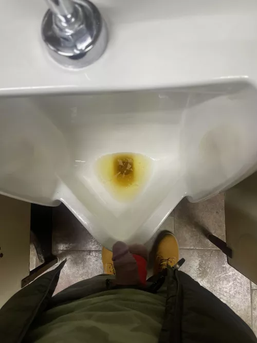 Waiting for someone to walk in the truck stop bathroom