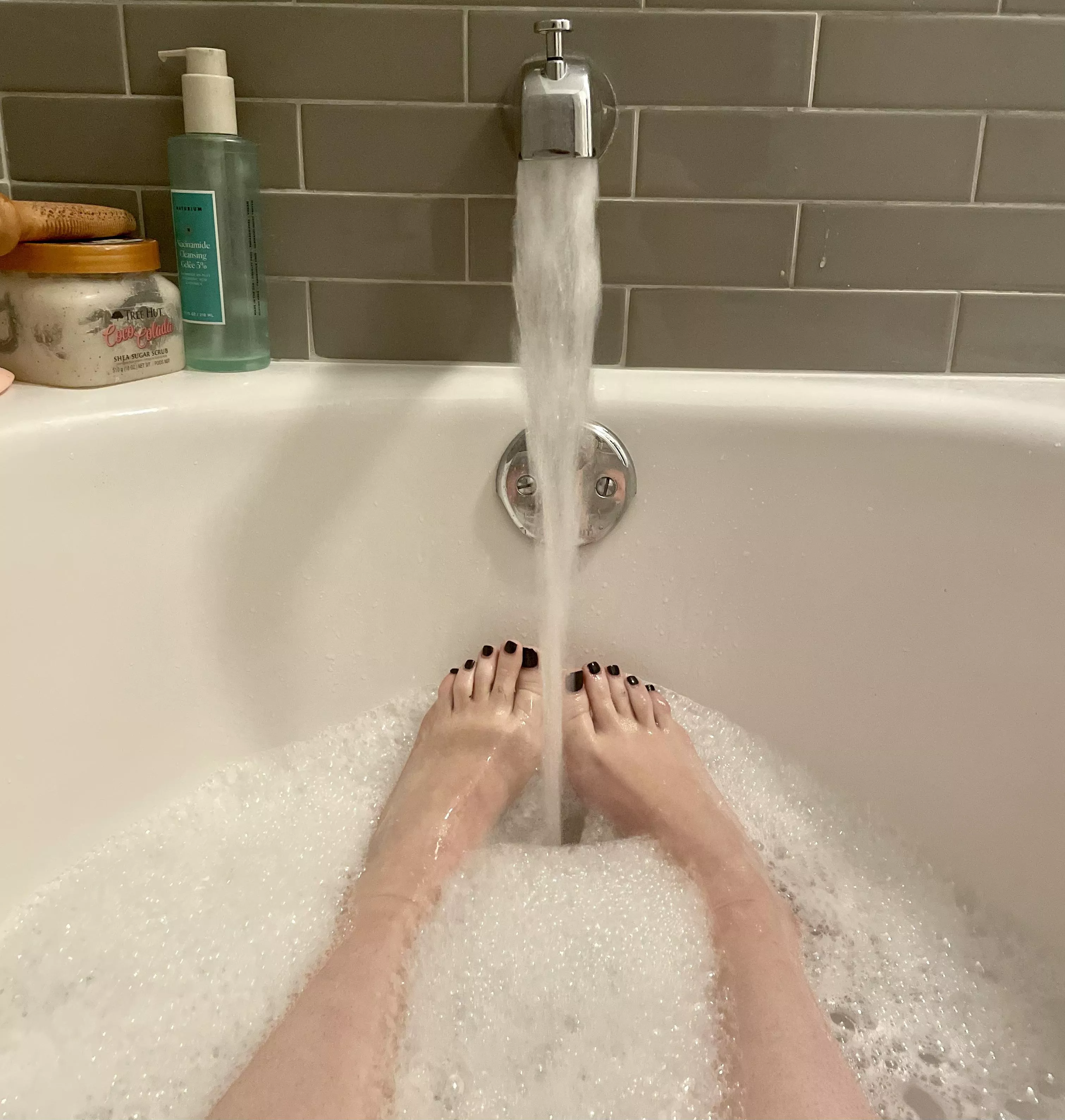 Cute toes in a warm bubble bath. Best way to end the day