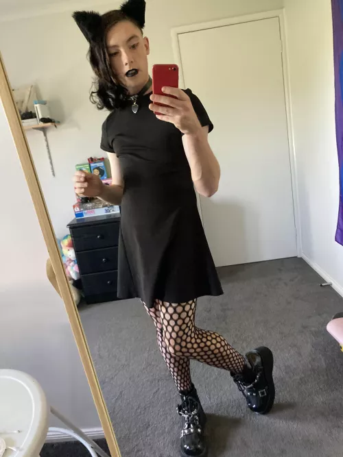 Femboy in goth attire