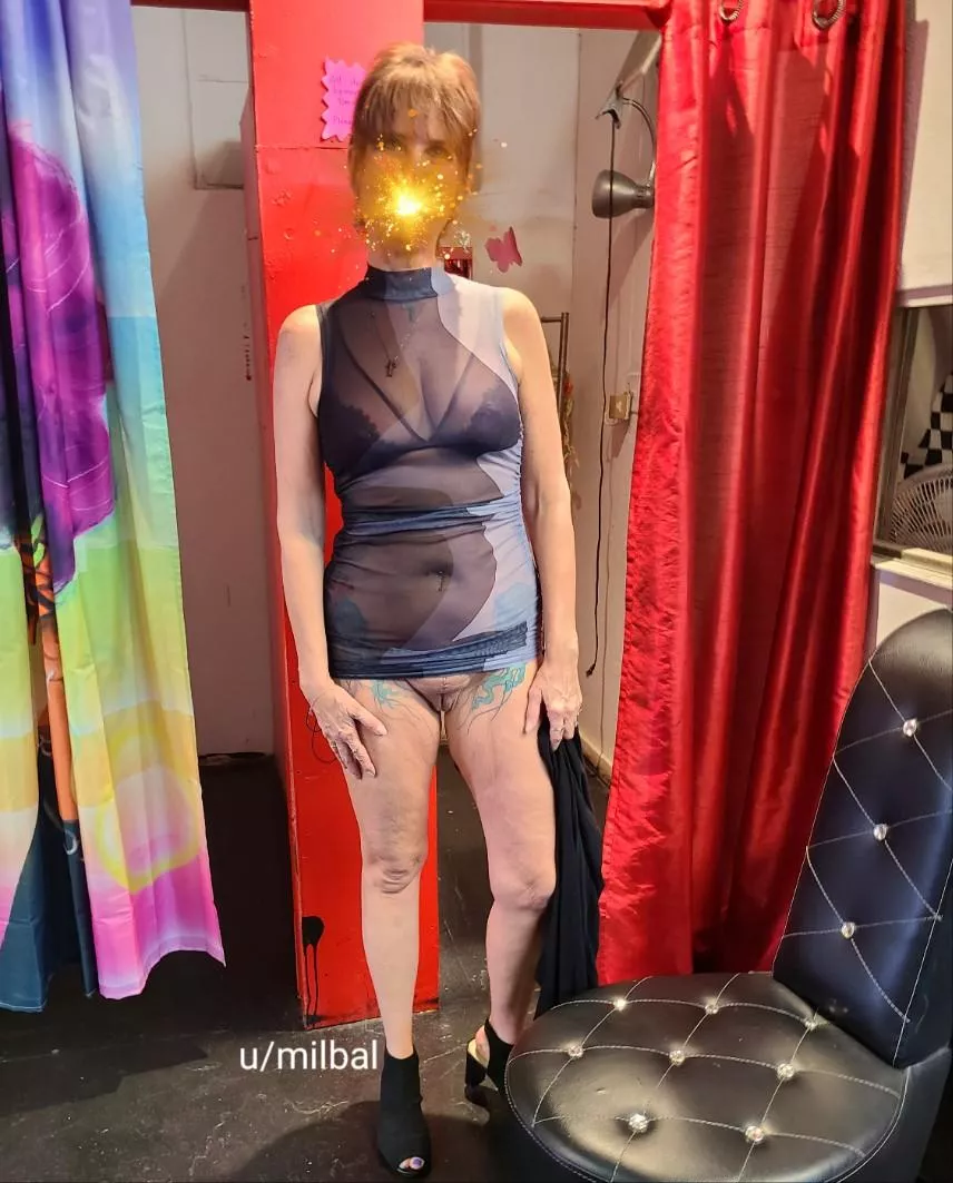 Was trying on a bunch of clothes and coming out for an opinion. This pic was just before the store owner and one of her clerks pointed out that I hadn't pulled the dress down quite far enough. Fortunately for my hubby, they all got a good laugh out of t