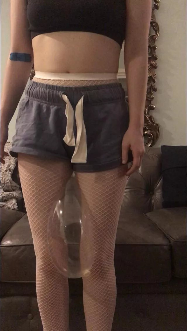 Breaking News: white fishnets girl crushes balloon between thighs like she crushes the patriarchy every day!