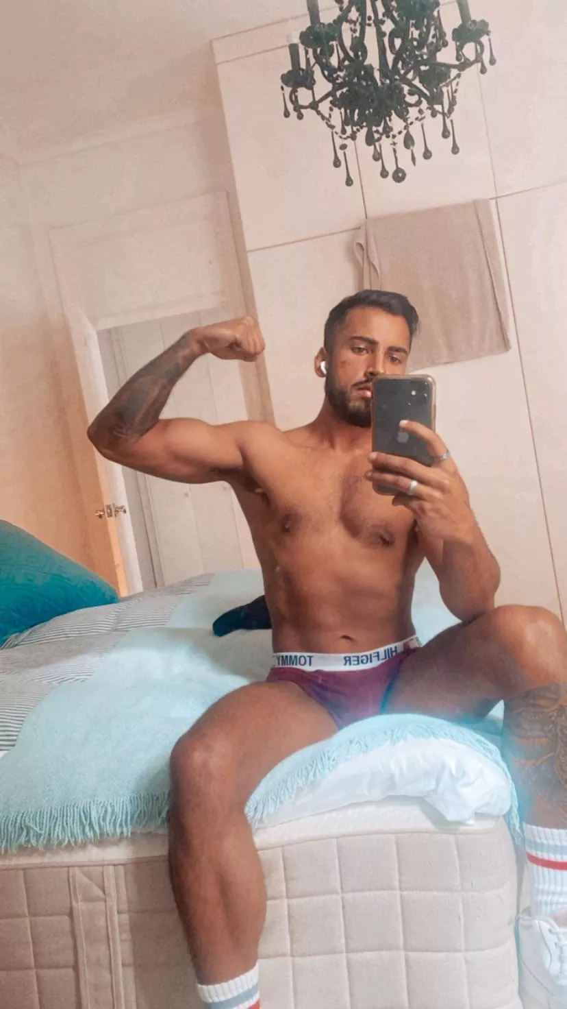 Casual flexing in bed