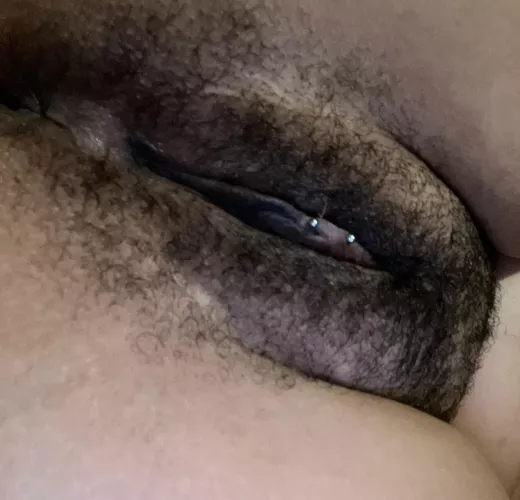 Pierced hairy pussy