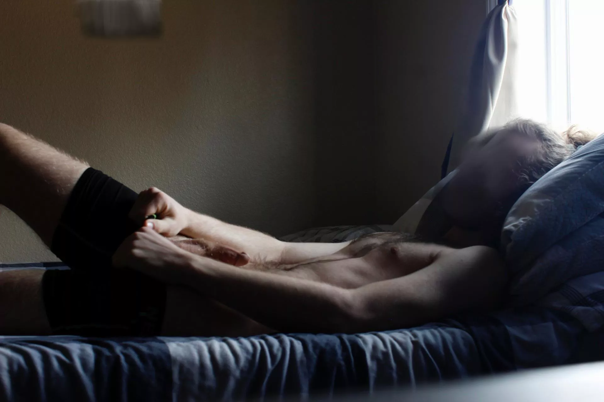 Undressing on the bed