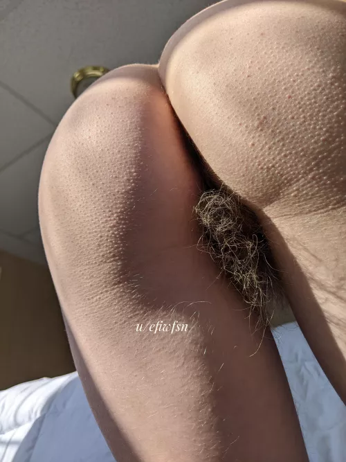 Blonde and bushy from behind