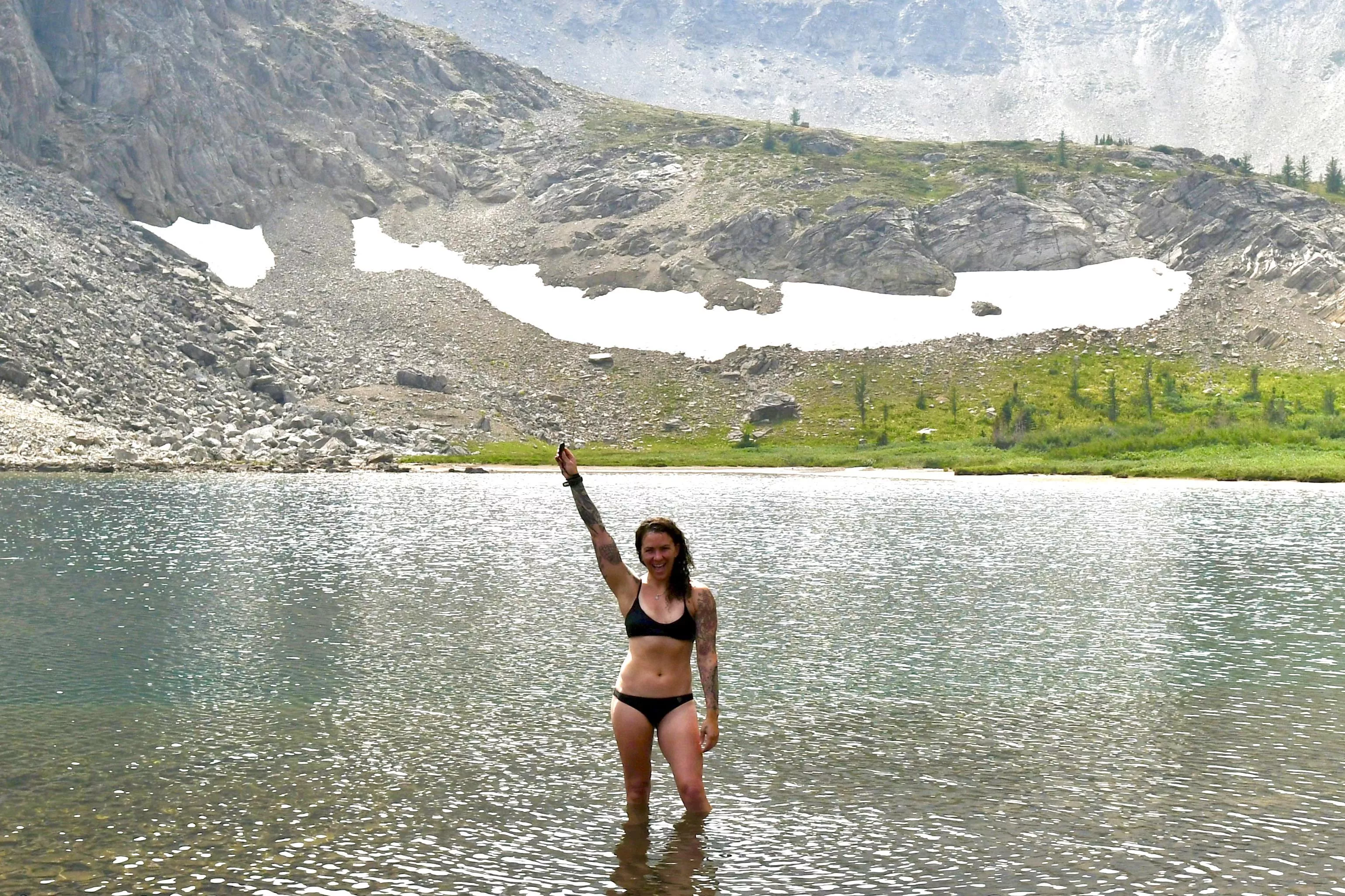 Would you dive in this cold mountain lake?