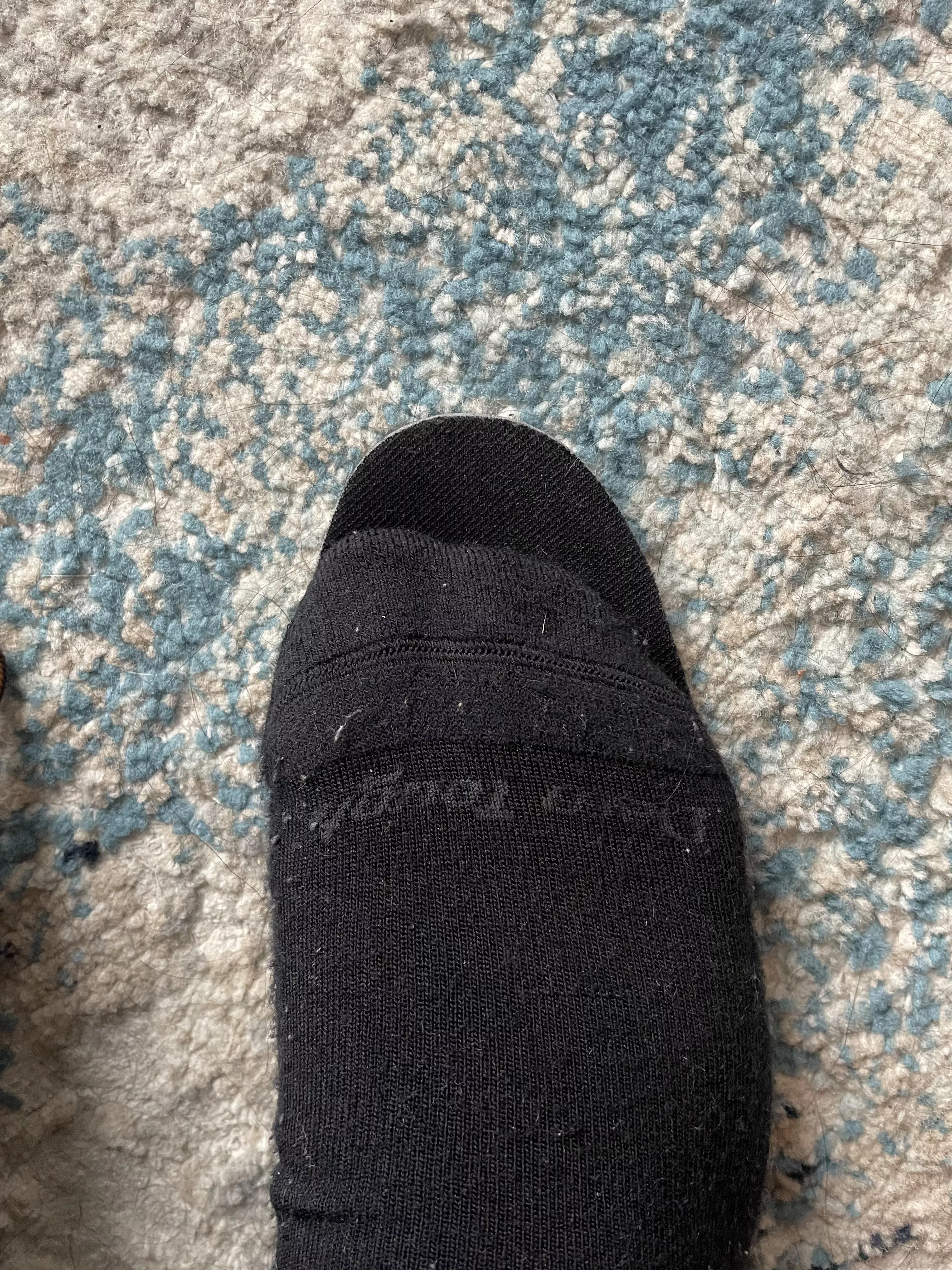 Is this much room at the toe too much? This is a Danner Bull Run Moc Toe insole. It’s about one thumbs width.