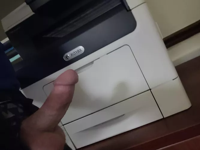 jerking off at the office printer...