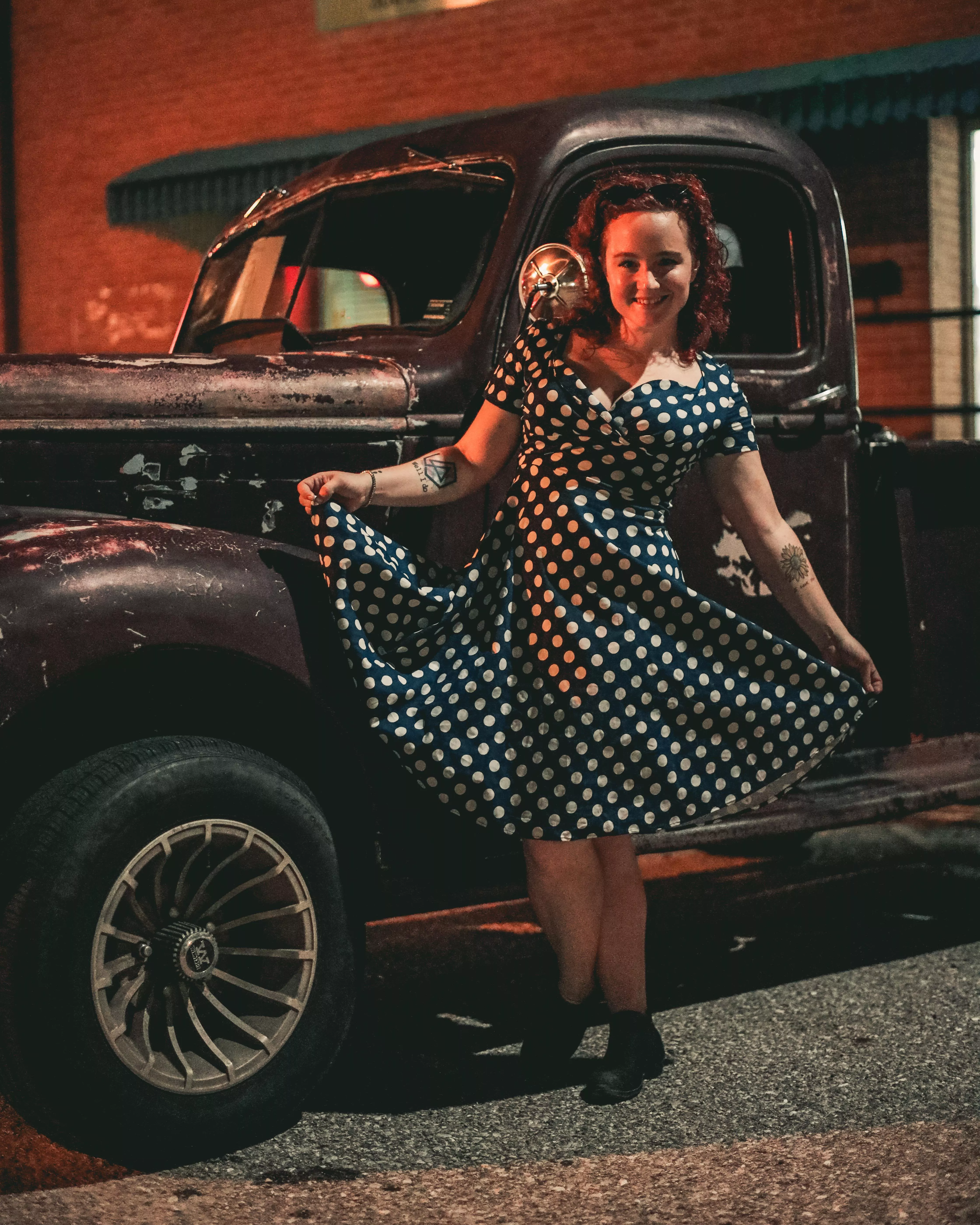 Old rusty trucks over new tuned cars