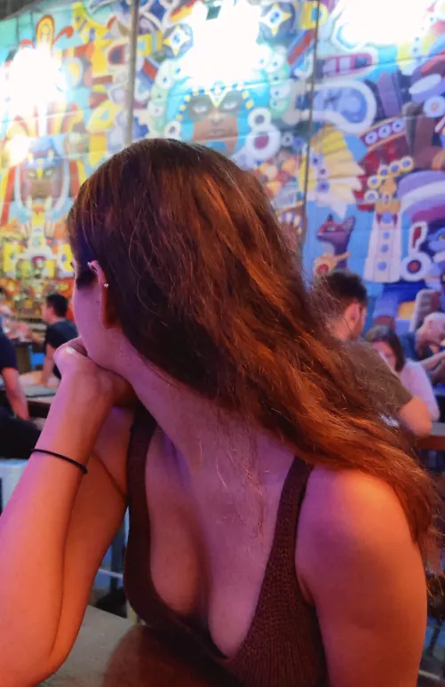 Chilling at the bar with my girls hanging dangerously close to being exposed (f)