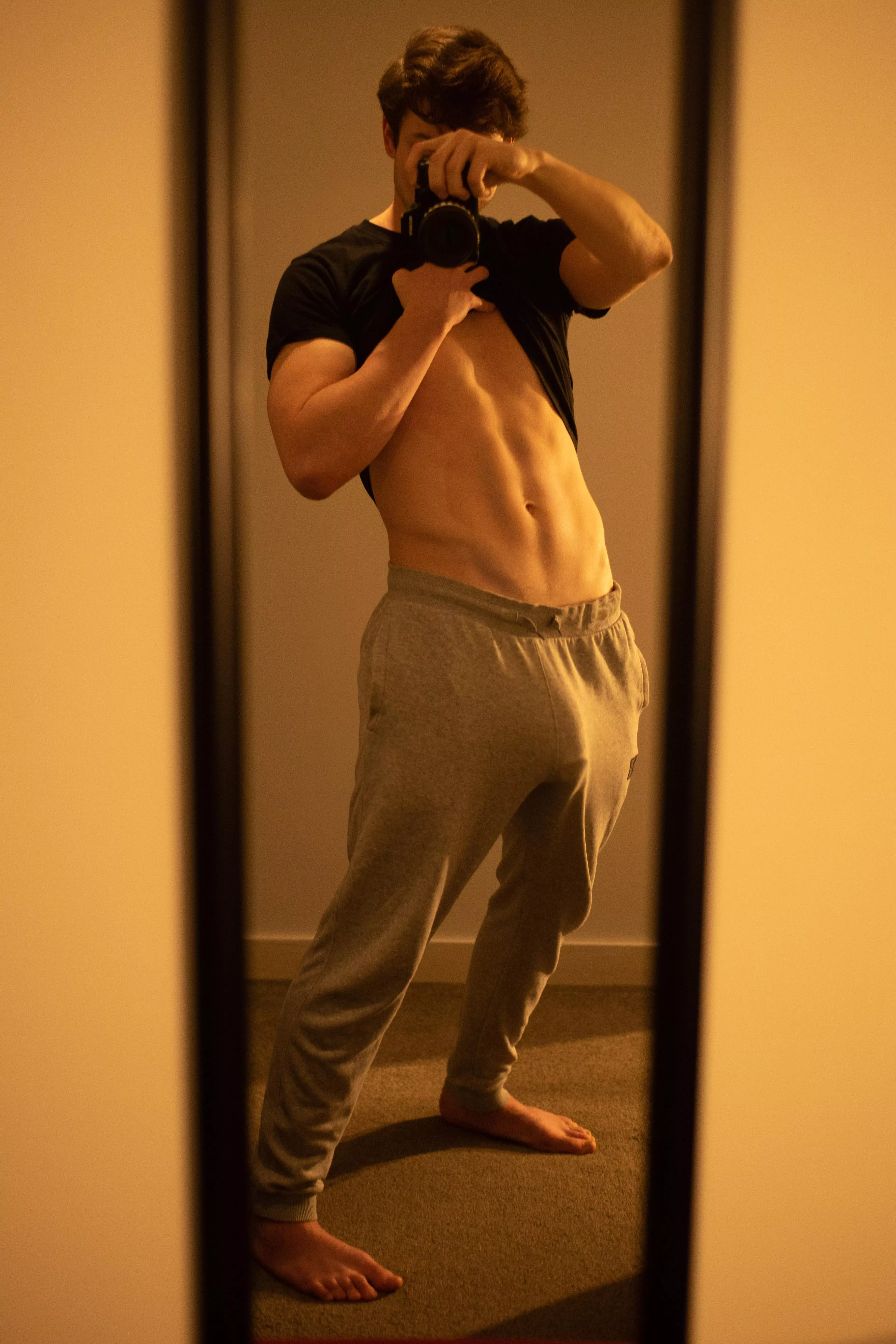 Get on your knees and pull these sweatpants off with your mouth