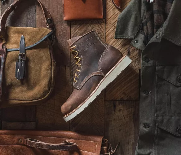 just got first pair of Whites Boots size 8.5 EE... i have about a half inch room in toe box, my heel slips a slight amount, and the heel is already sore from just a few minutes of wearing... should i go down a half size? I'm use to thorogoods which are 