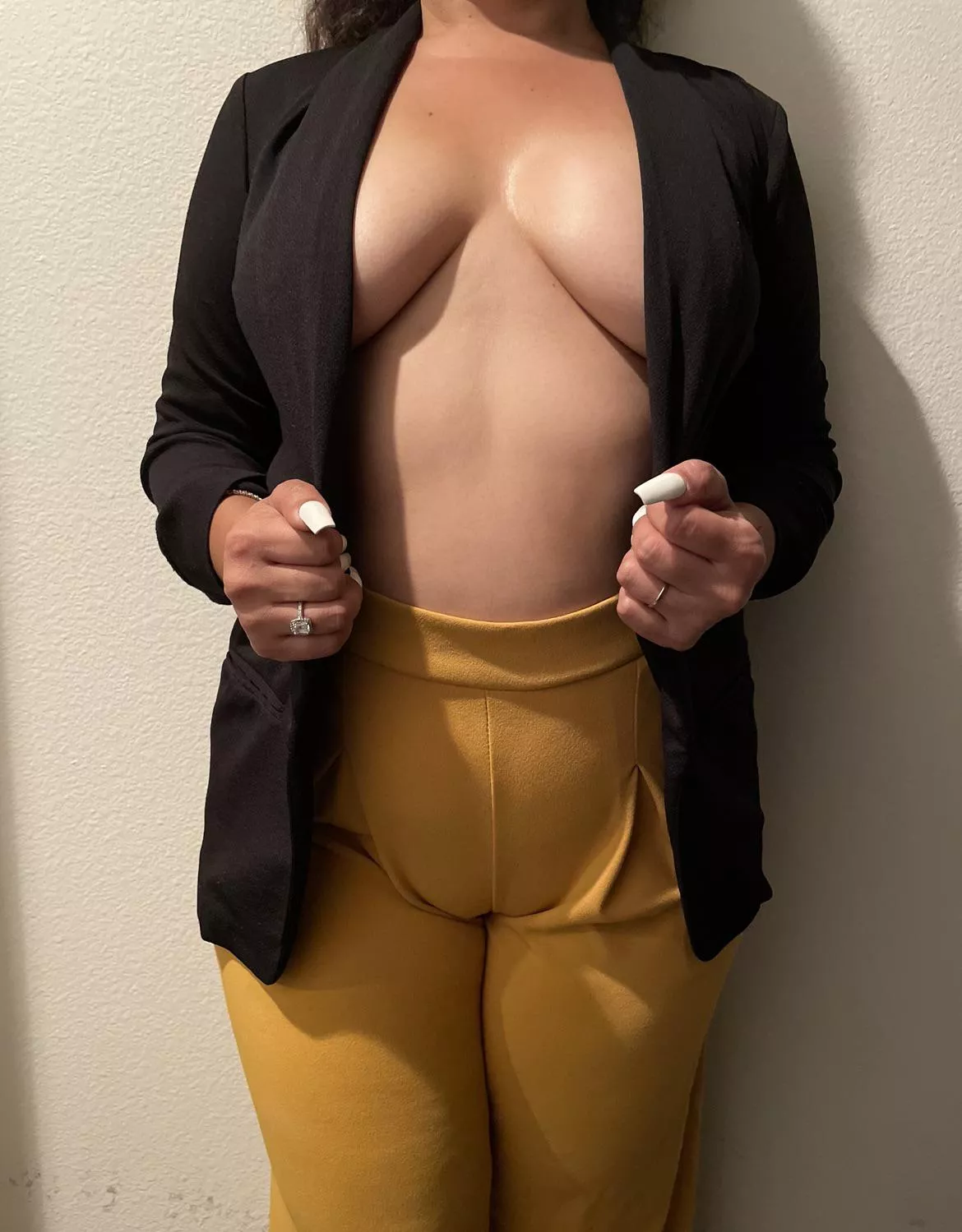 The Wife is attending a big business conference today. She wants your opinion on her outfit, appropriate? Will it help her land deals?