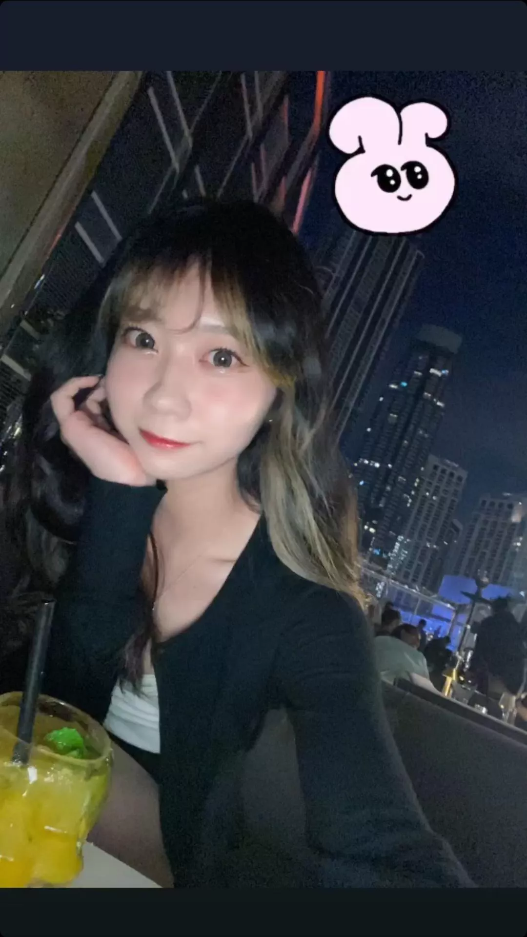 Cute Japanese girl with a drink