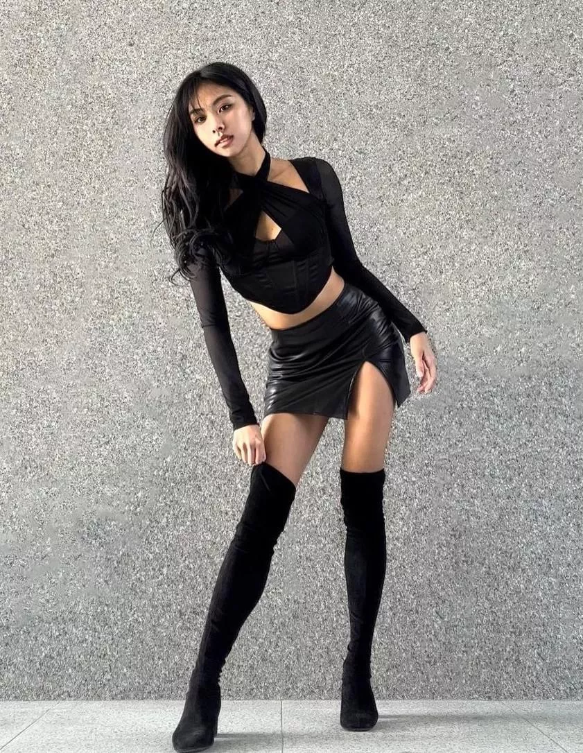 Tight skirt and thigh high boots