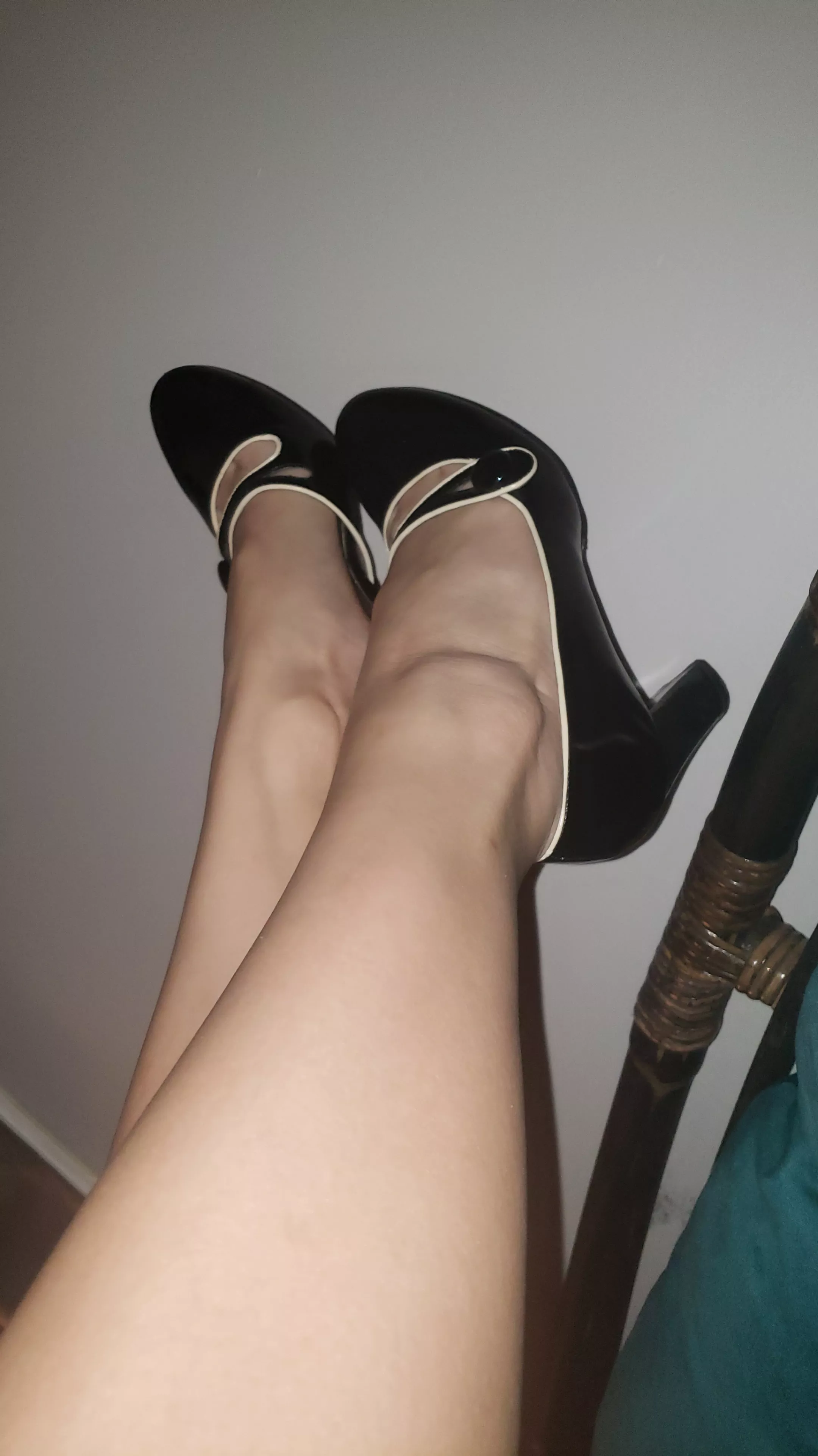 shiny black heels.