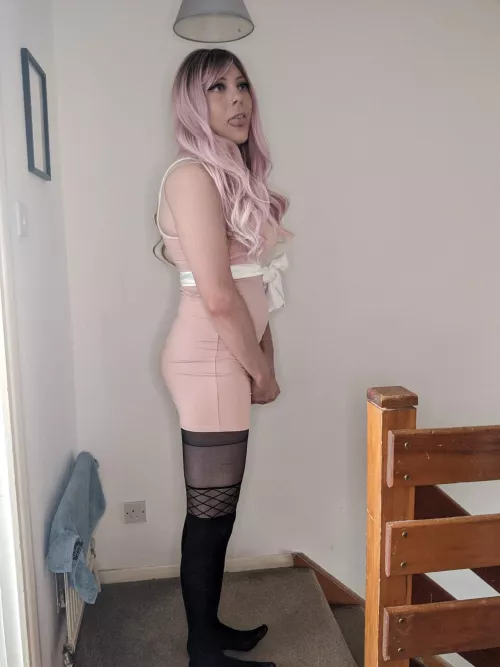 Trying to look like a cute little sissy...