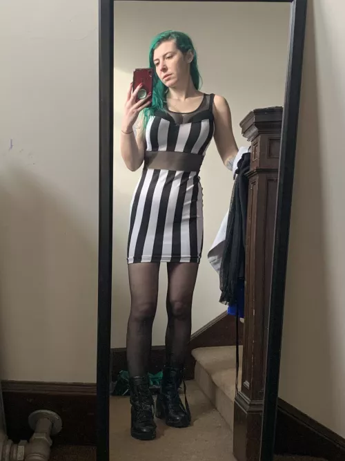 Combat boots and a tight dress