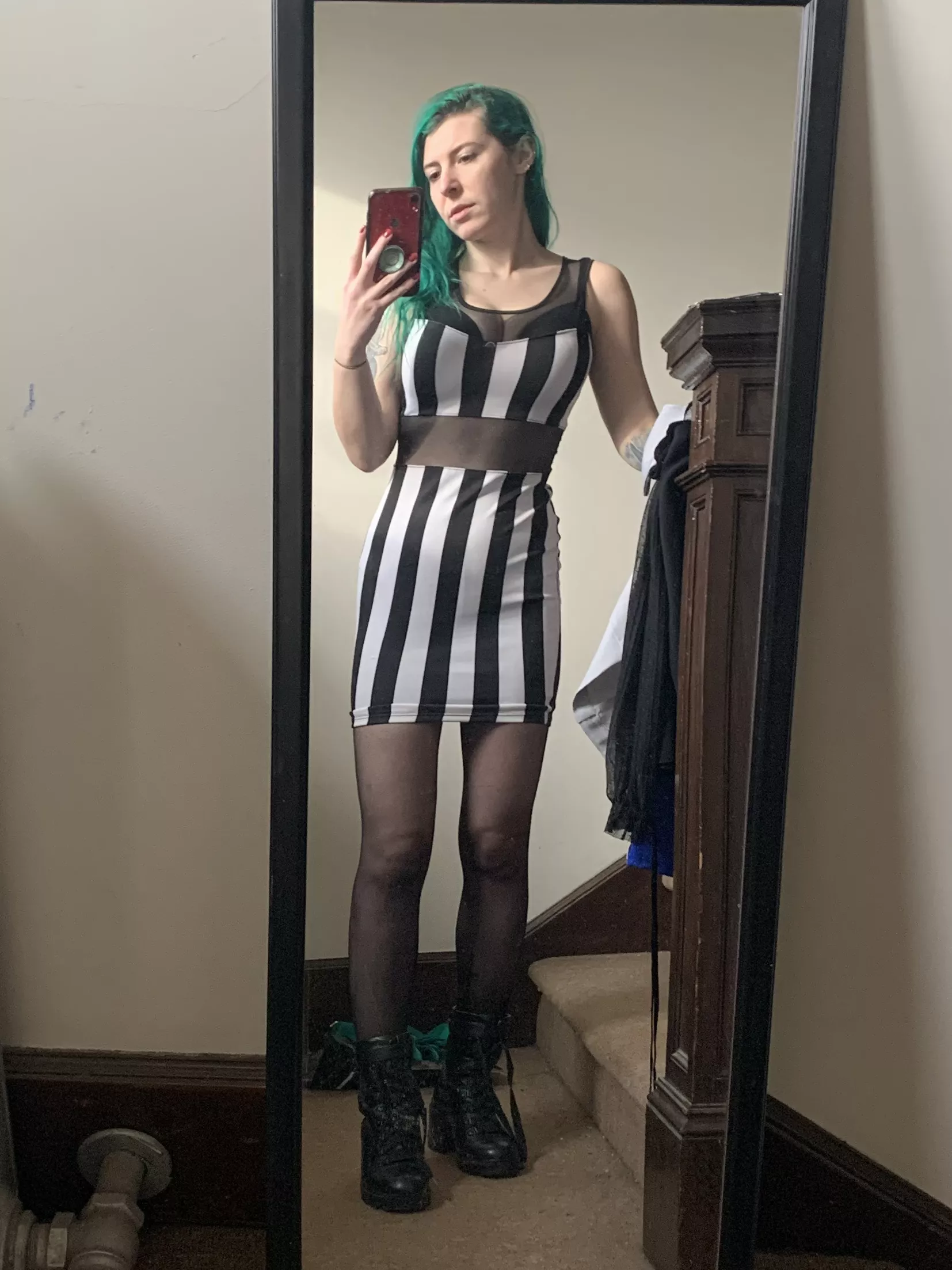 Combat boots and a tight dress