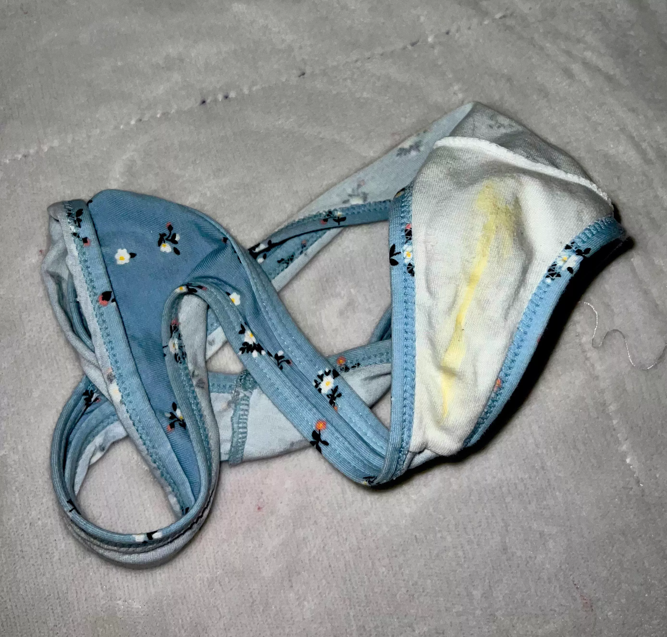 Drip dried on my light blue floral print thong