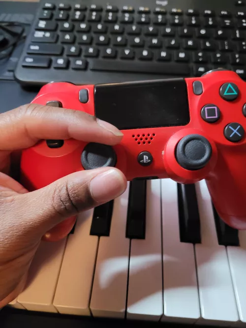 I don't care the console...I will forever hold the joystick like this! Bonus Note: I don't type on the keyboard properly and I type 70wpm before compromising accuracy. Fight me!...with pillows...no fists...just pillows.