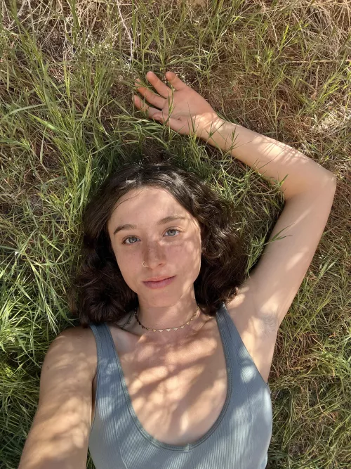 Sun kissed laying in a patch of grass, my favorite kind of day 🌿