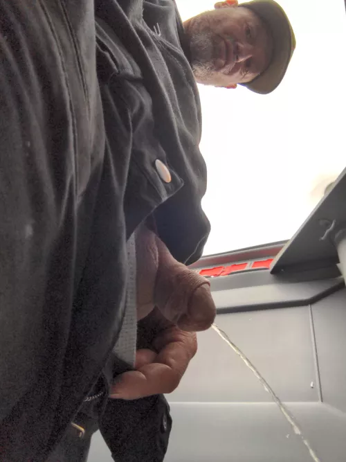 construction daddy taking a pee break.