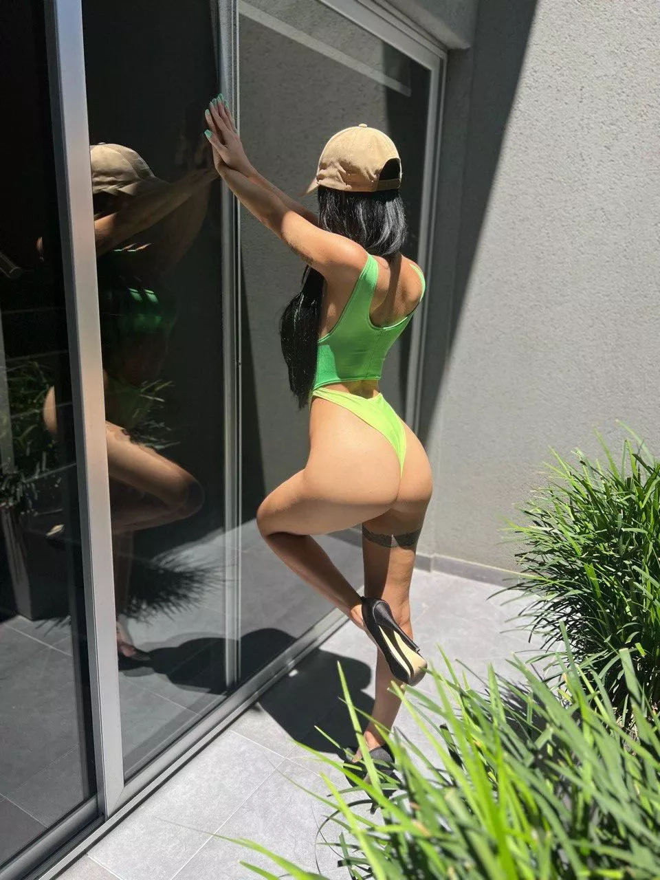 He looks in the mirror, his reflection sensual..