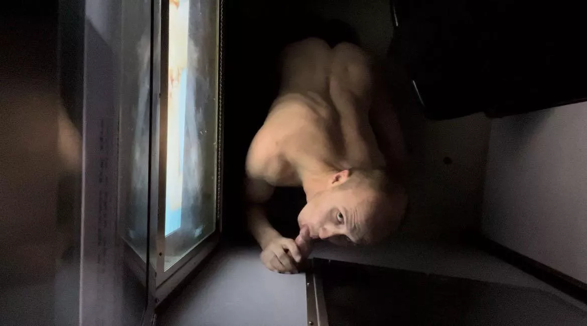 Love being naked in a seedy gloryhole booth