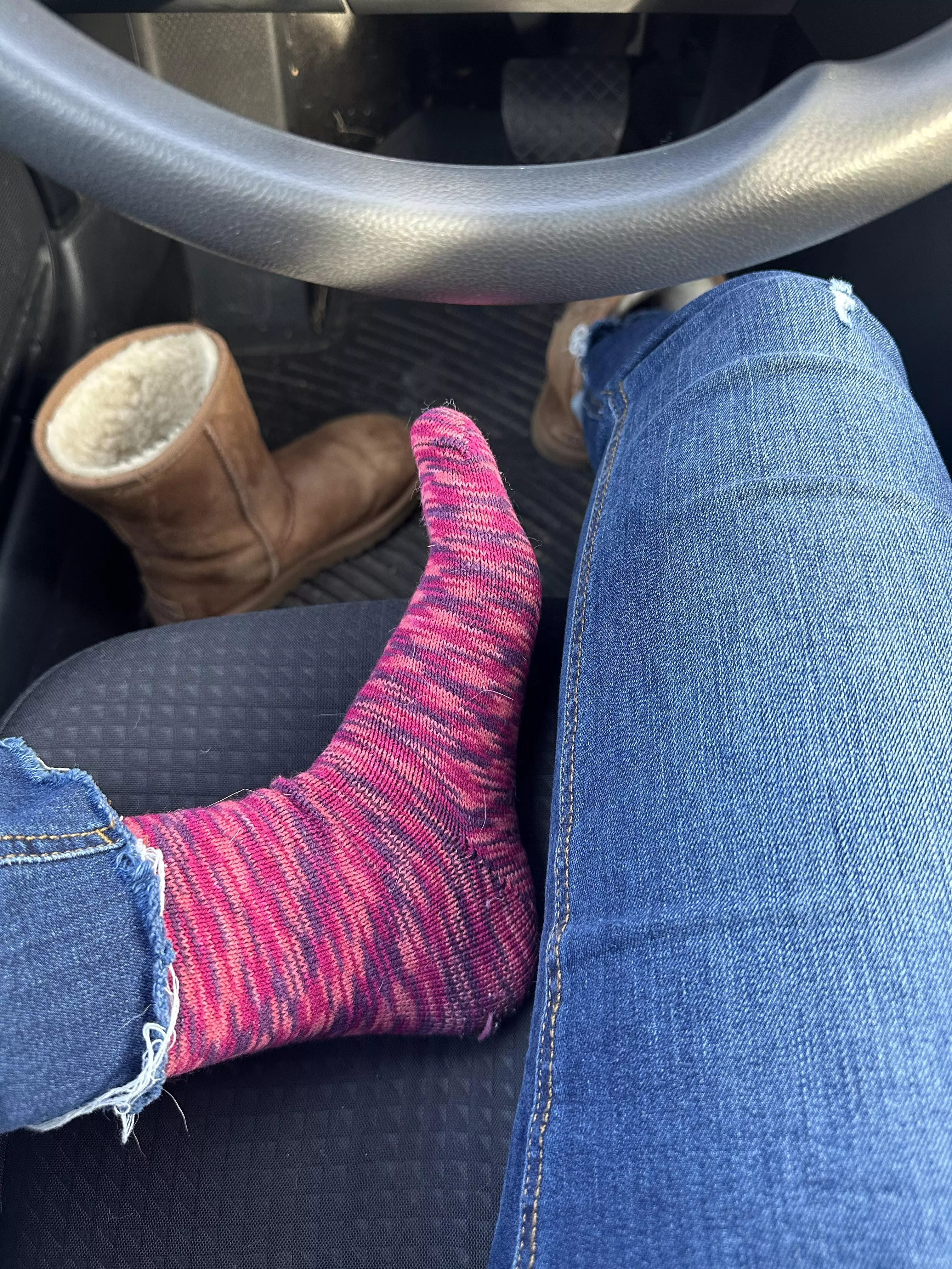 Showing off my fun socks while I wait at the vet's