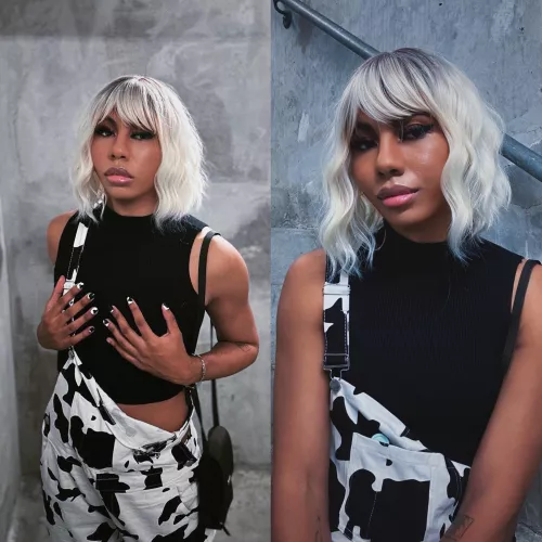 Traded in the skirt & thigh highs for something more street.