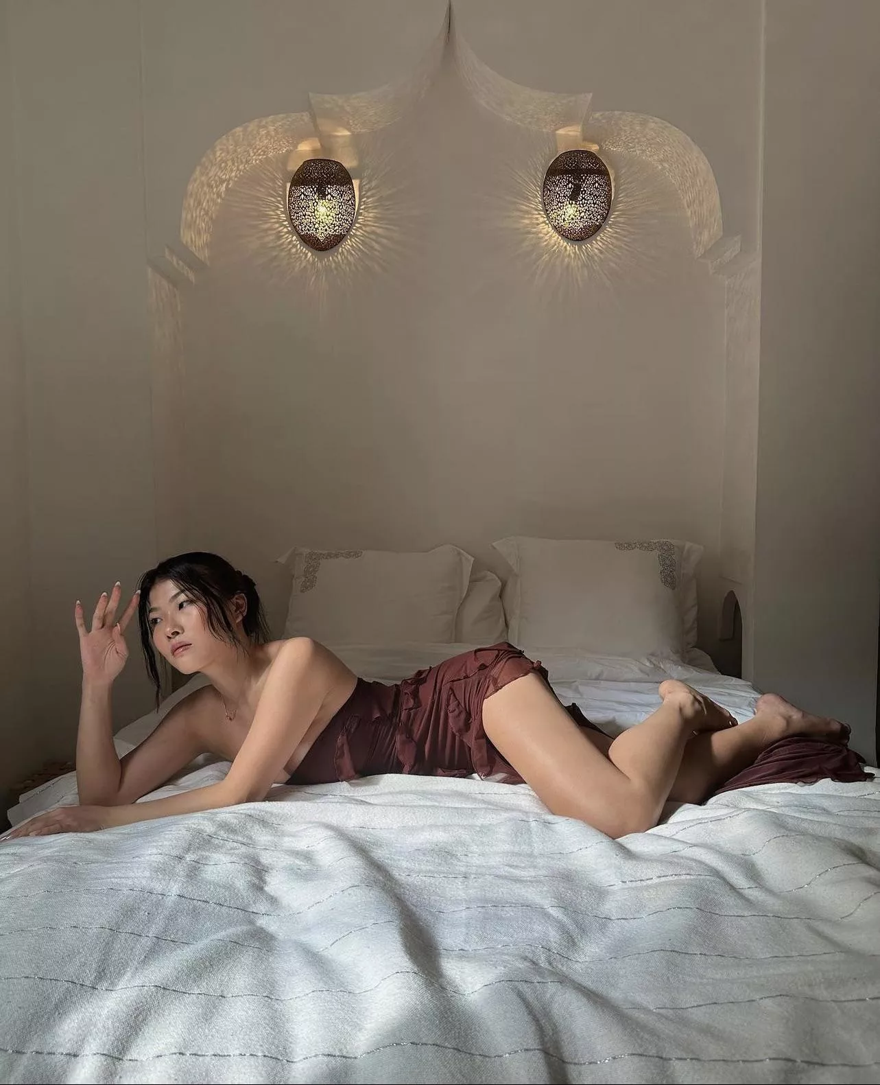 Japanese babe in bed