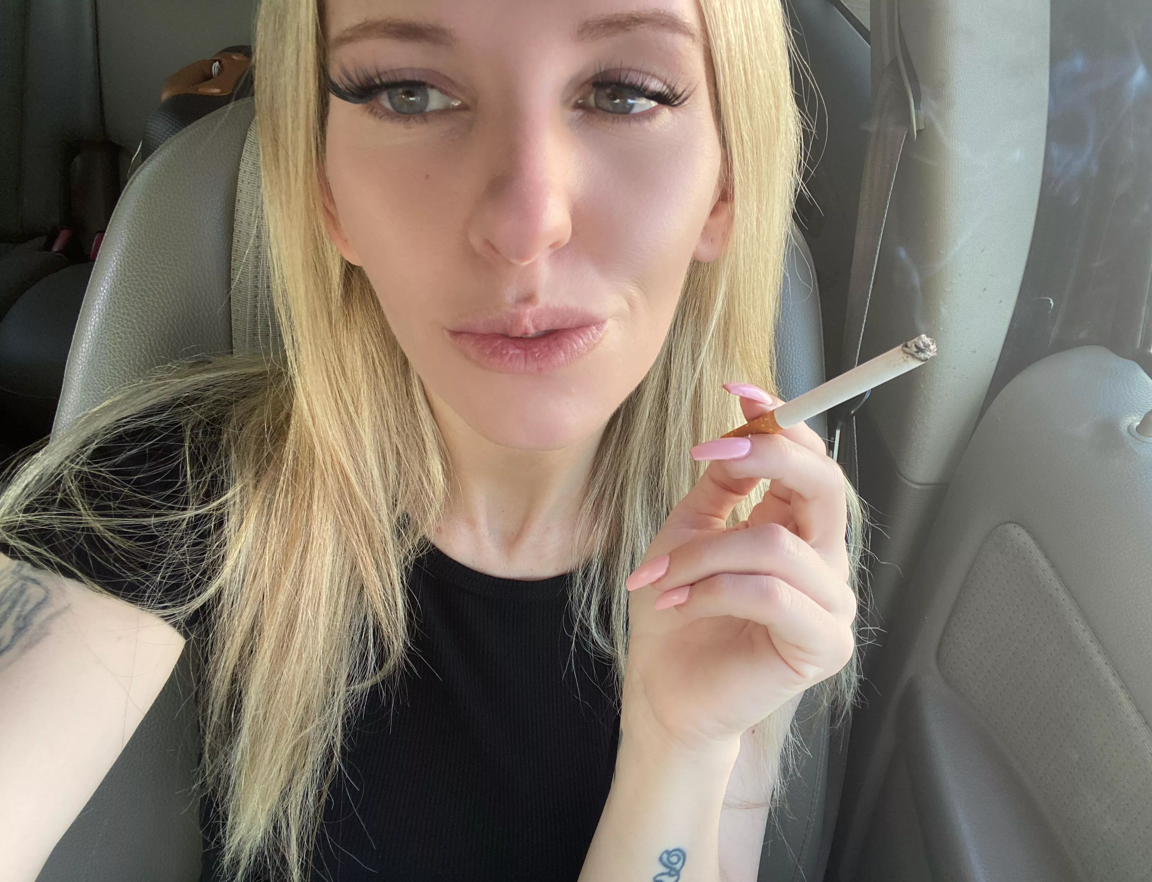 Relaxing in my car with a nice smoke