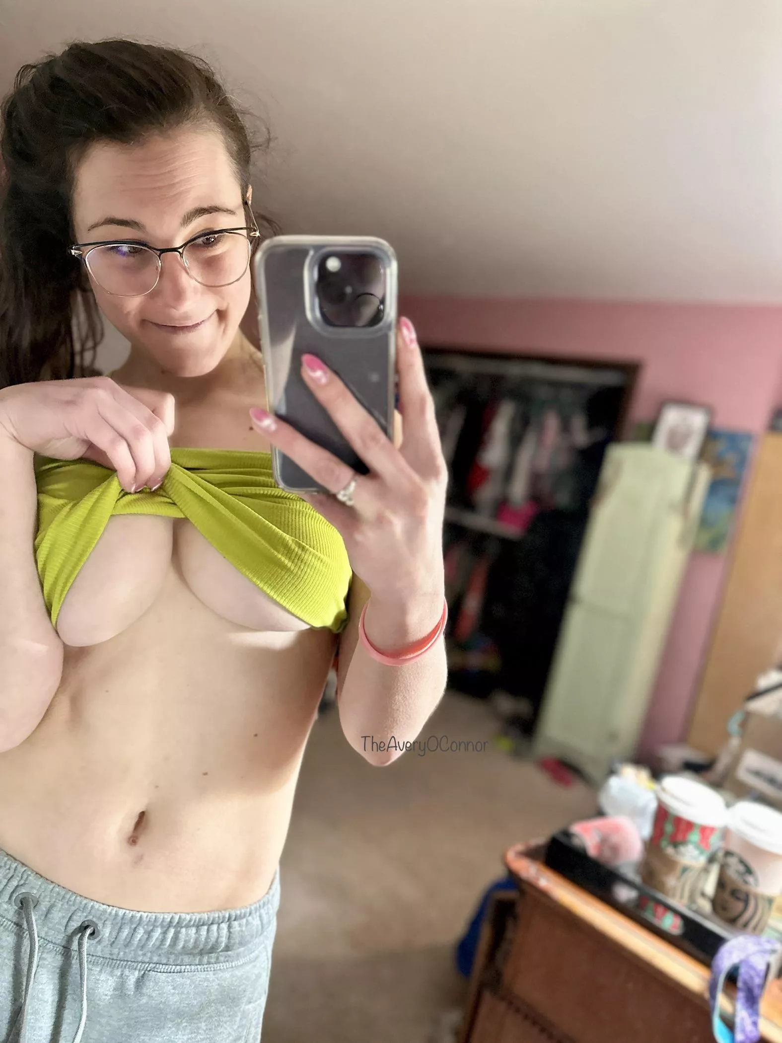 Tugging tank to show off my underboob. Duhhhh!