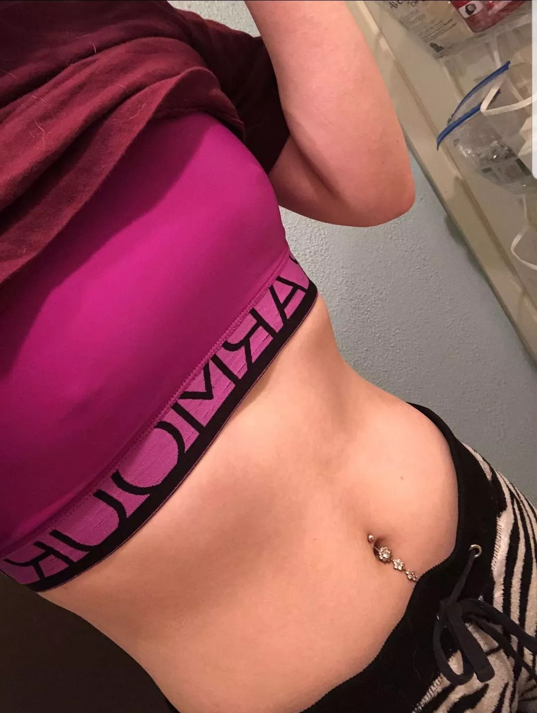 Pierced in the sports bra