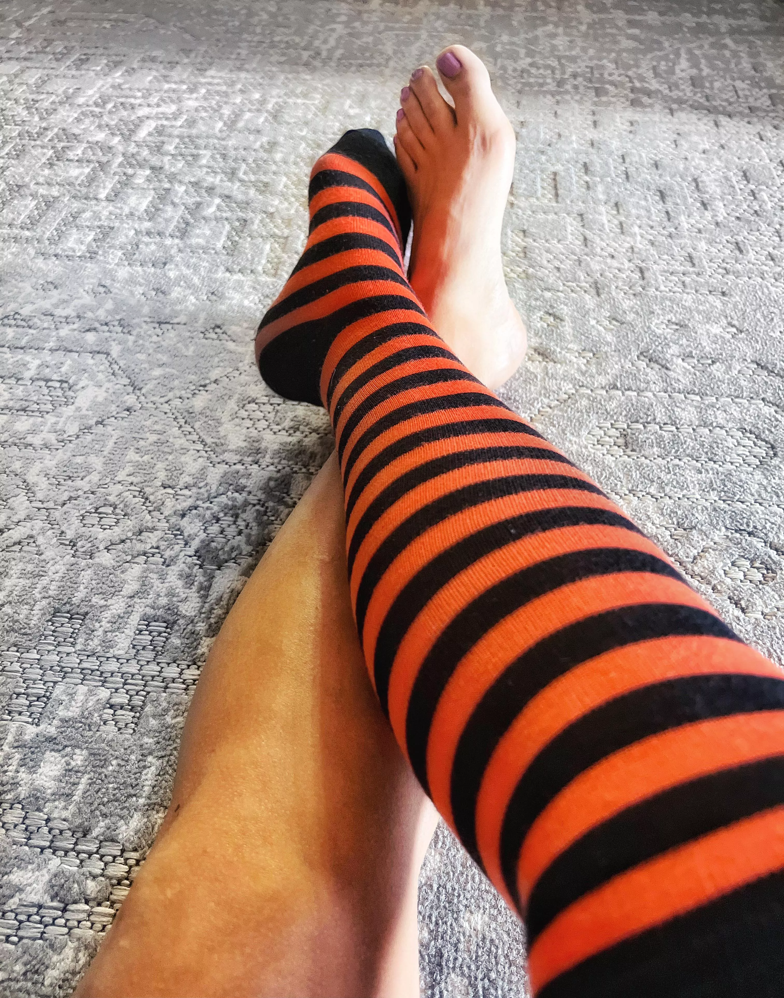 Wearing ONLY one of my Halloween socks, nothing else…🧡🤭